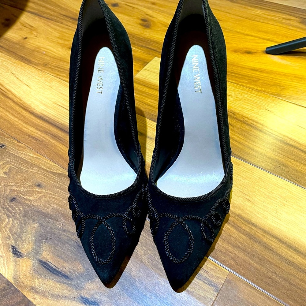 Nine West black suede pumps.
